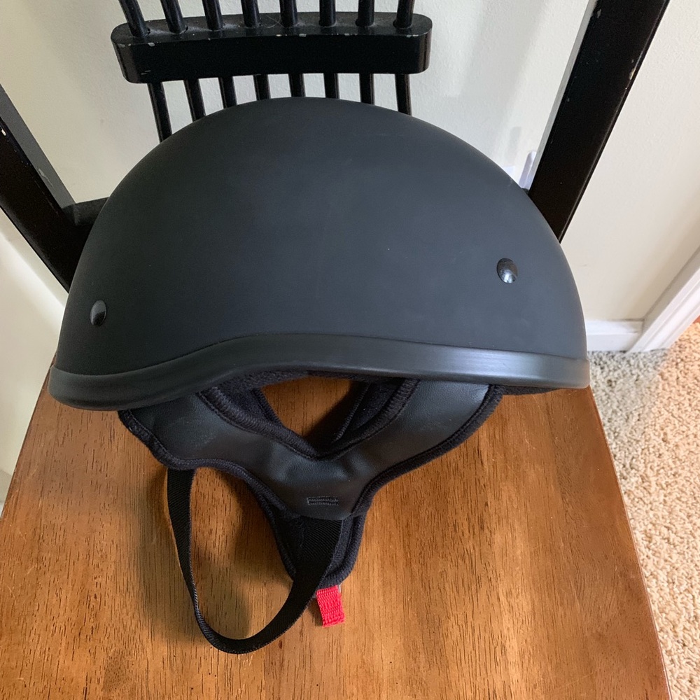 Black motorcycle half helmet. DOT approved.